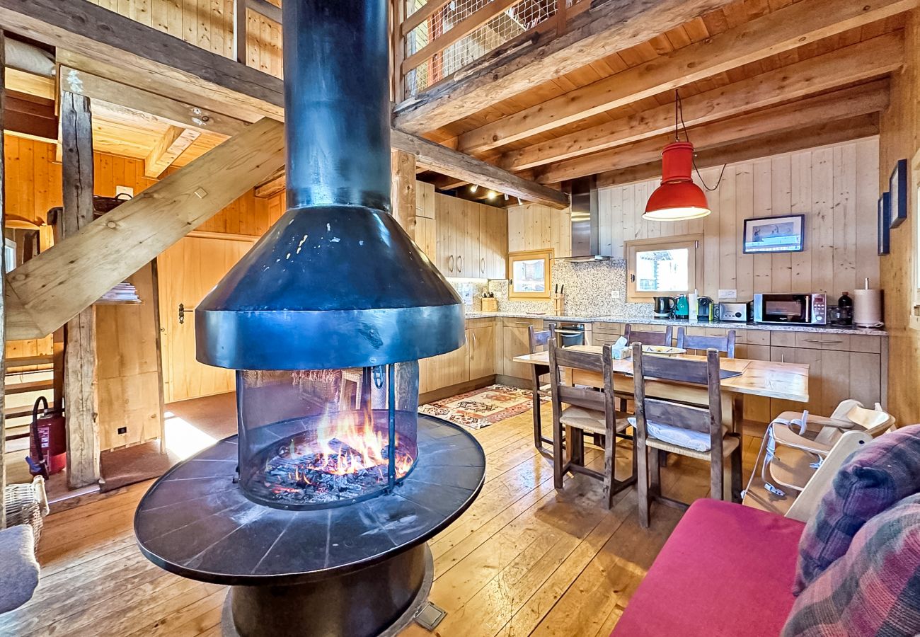 Living room with central fireplace
