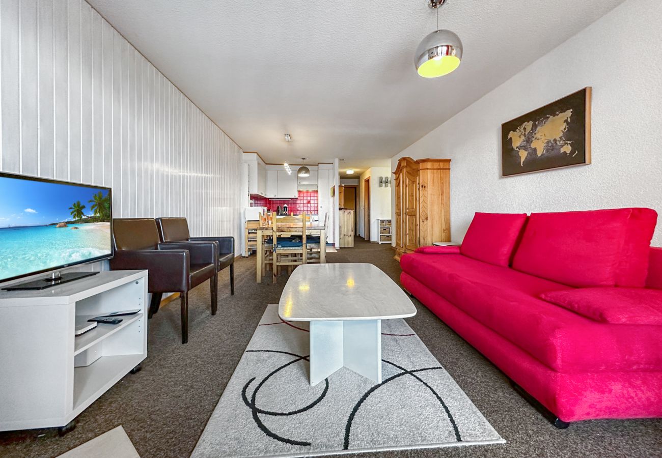 Living room with dining area and kitchen