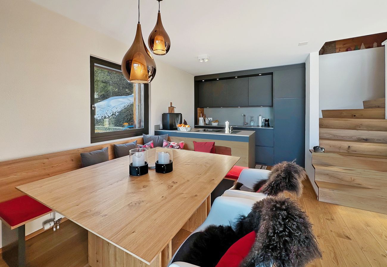 Recently renovated kitchen opening onto a dining room, offering a cosy atmosphere