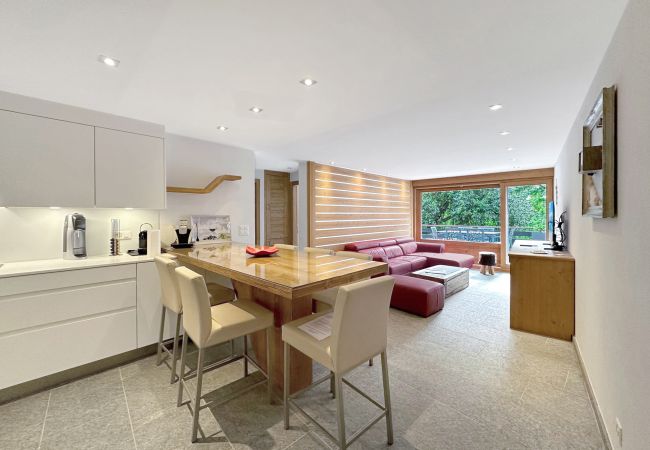 Living area with open-plan kitchen