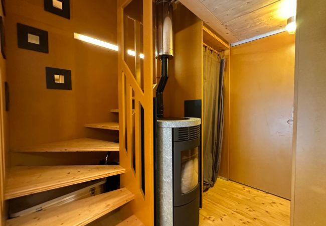 Photo of the stairs with a pellet stove