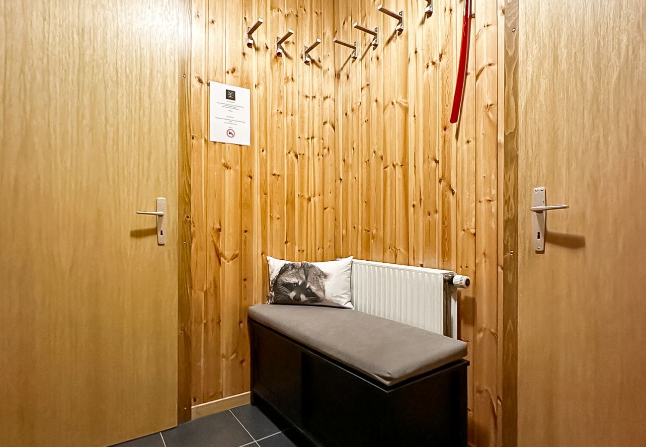 Un espace de rangement pratique pour accueillir vos vestes et chaussures
